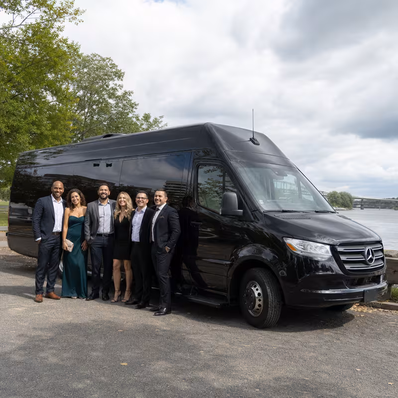 Group beside a Mercedes Sprinter limo from the New Brunswick fleet