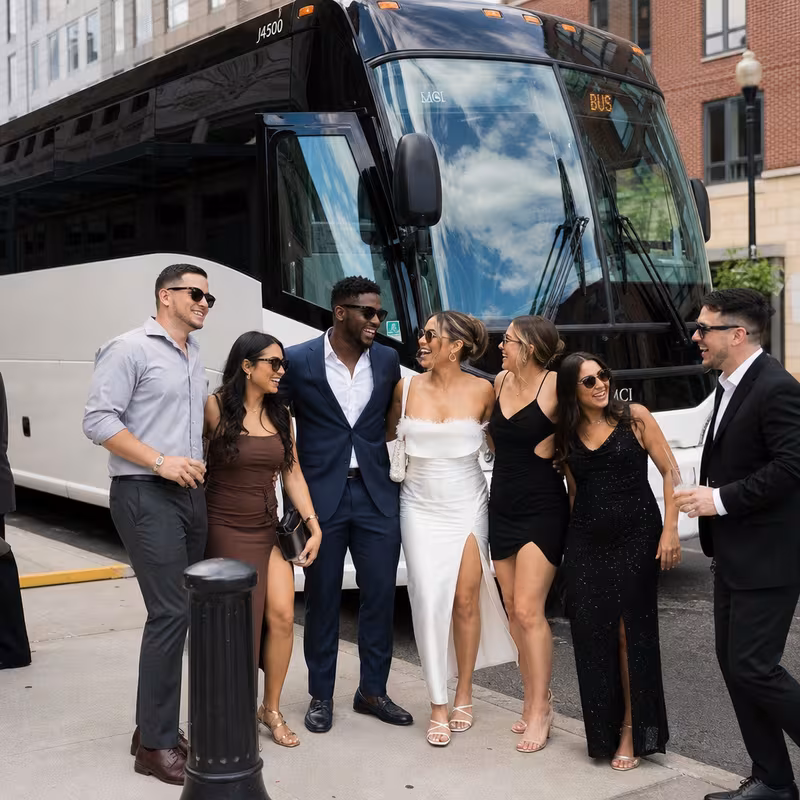 Passengers loading luggage while boarding an New Brunswick group shuttle