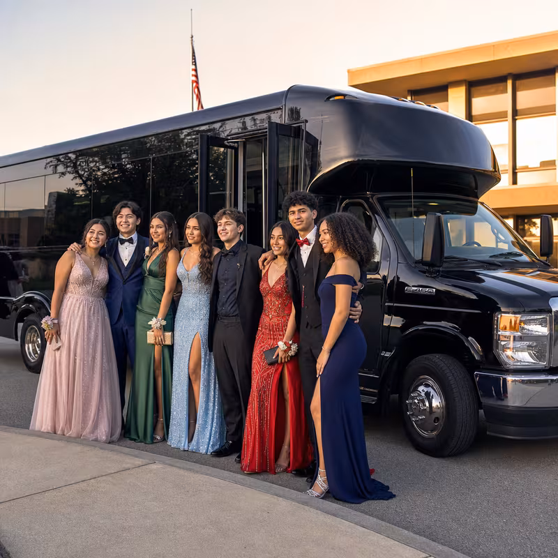Group boarding a white charter bus for Prom & Homecoming Transportation transportation in New Brunswick
