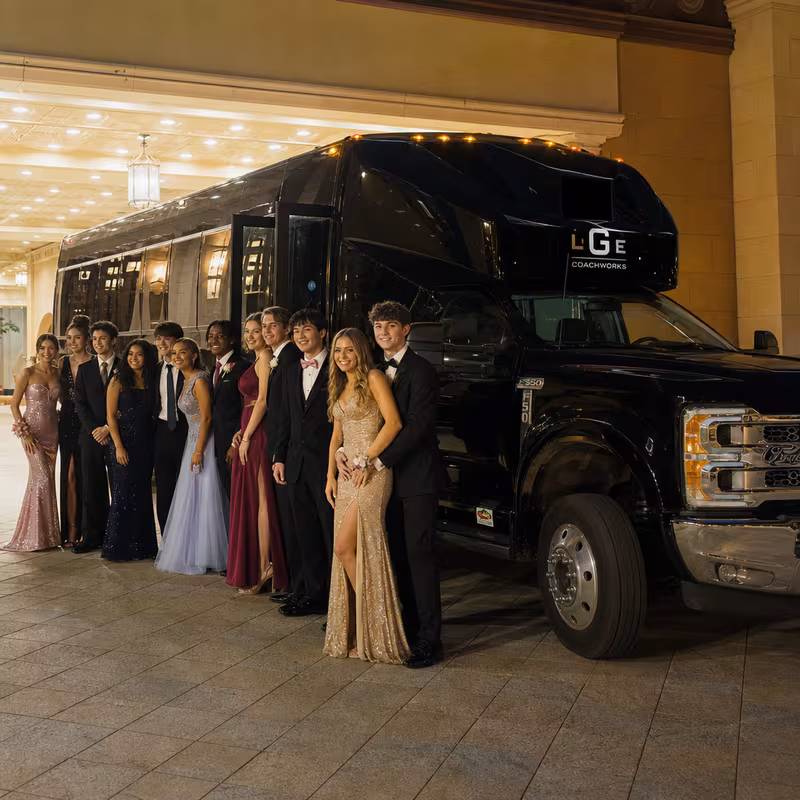 Party bus interior with wraparound leather seating and LED lighting in New Brunswick