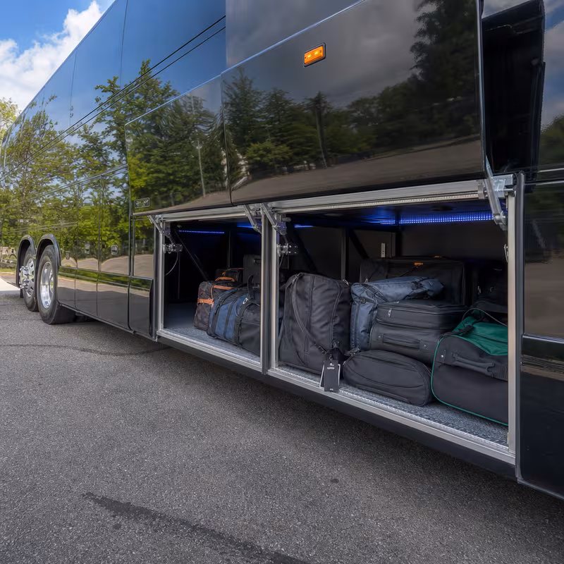 Party bus interior with wraparound leather seating and LED lighting in New Brunswick