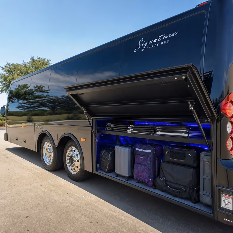 Party bus interior with wraparound leather seating and LED lighting in New Brunswick